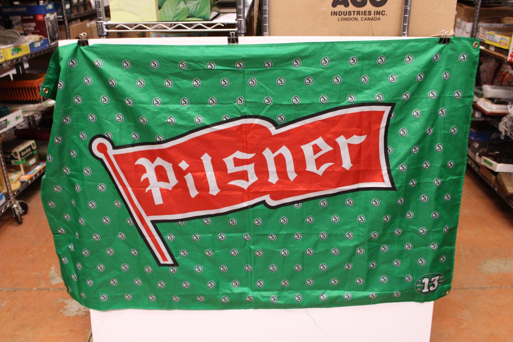 Pilsner Saskatchewan Rough Riders Flag - Bodnarus Auctioneering