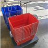 Image 1 : STACK OF 11 RED SHOPPING BASKETS IN HOLDERS