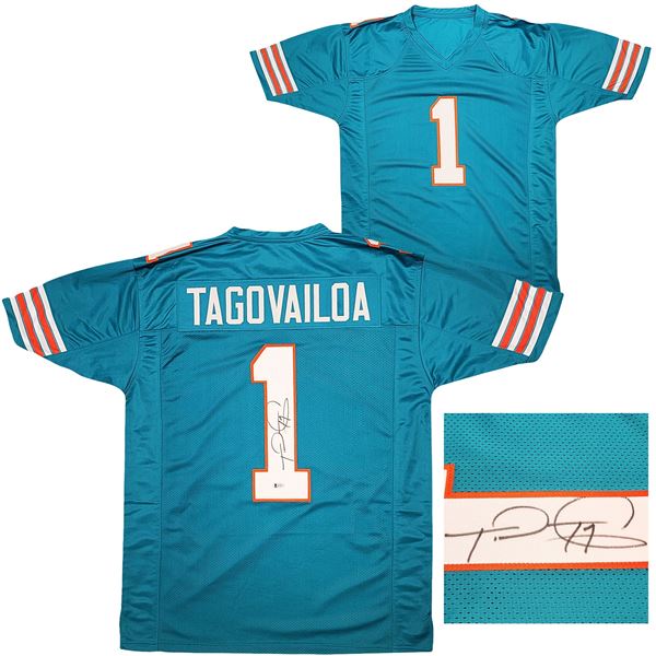 TUA TAGOVAILOA SIGNED MIAMI DOLPHINS FOOTBALL JERSEY (BECKETT COA)