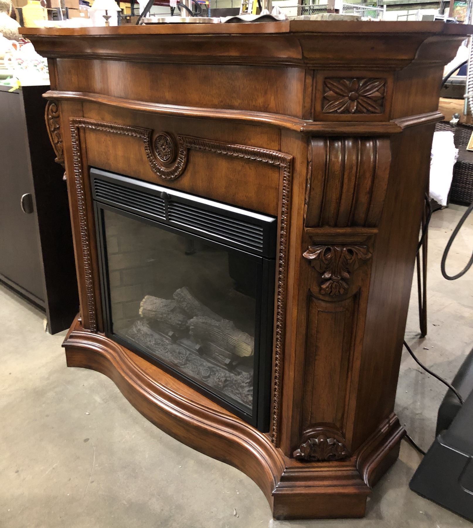 Twin Star electric fireplace model 28EF003GRA in wooden frame from