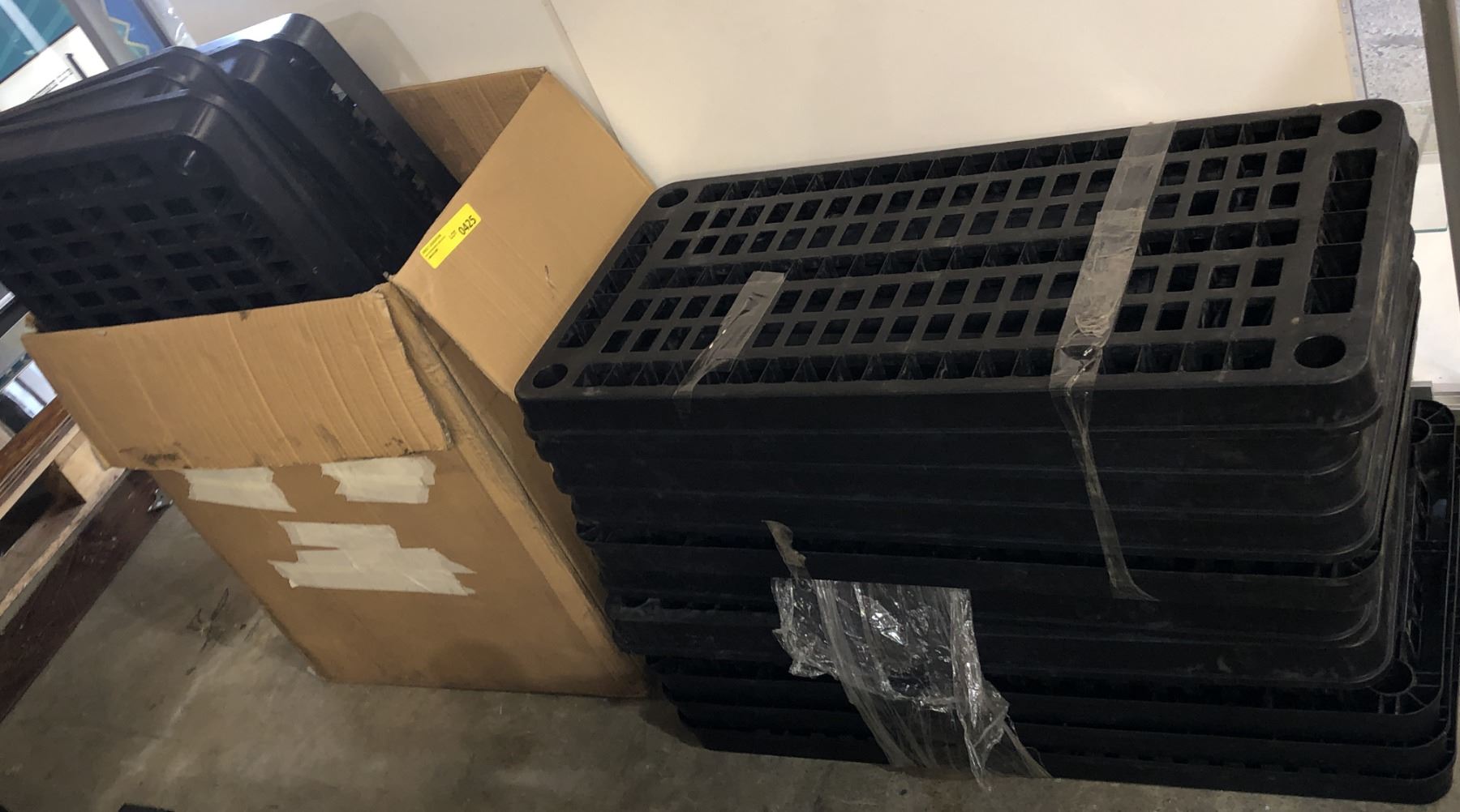 Large group of plastic shelving racks