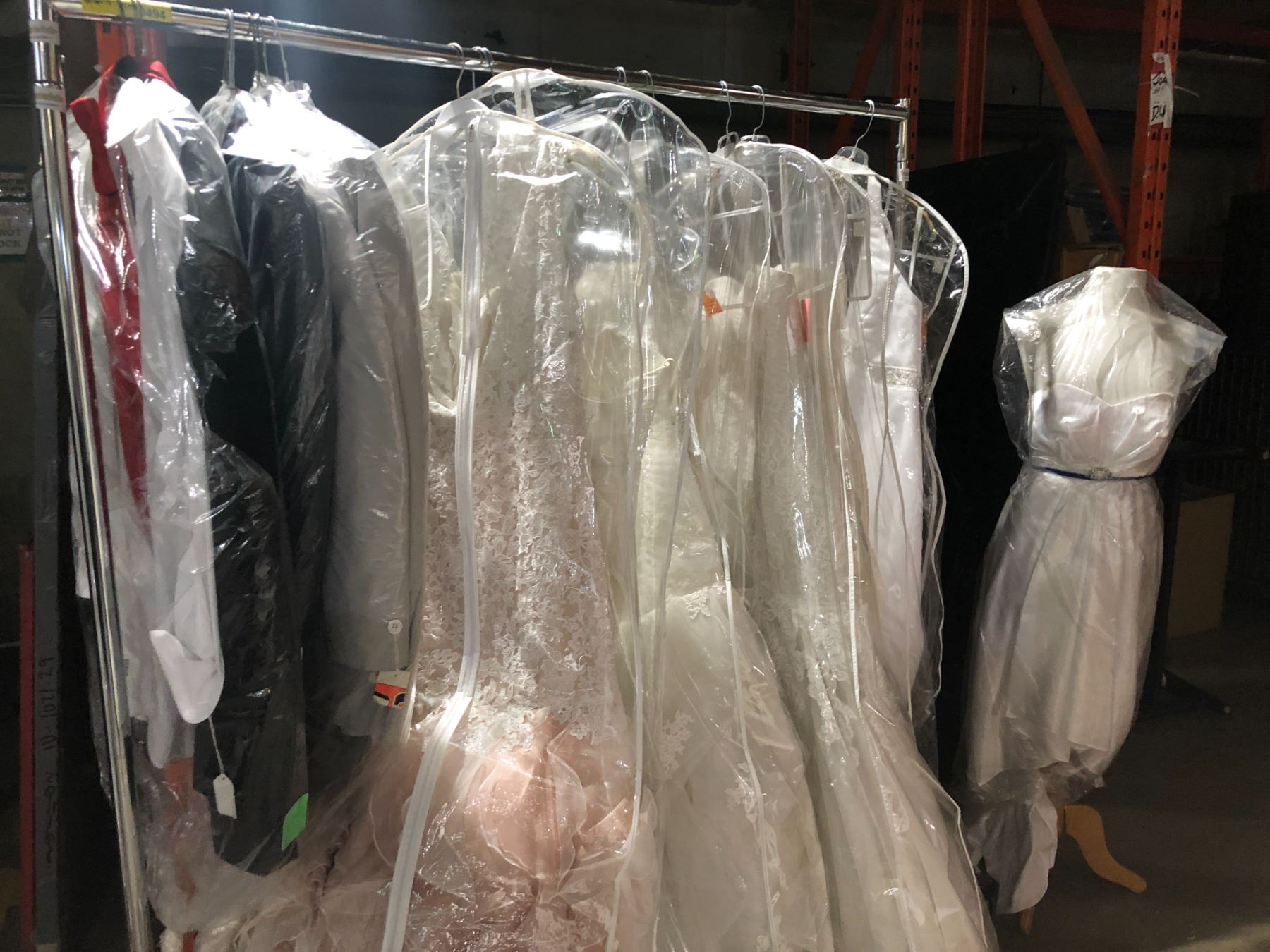 Used Gown Rack Rack full of assorted wedding dresses/ gowns and 2 men's tuxedos (from ...