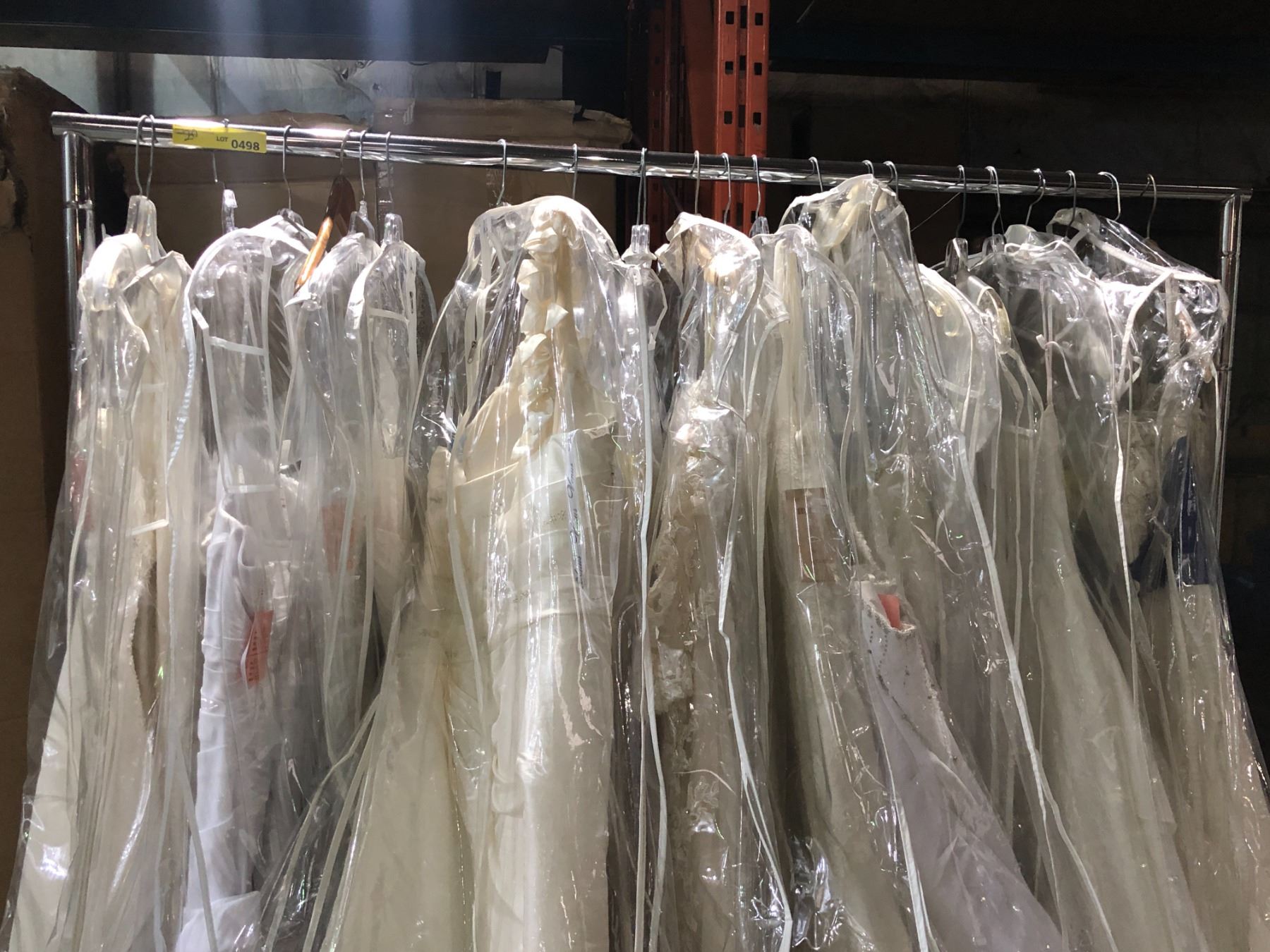 Used Gown Rack Rack full of assorted wedding dresses gown from wedding store closure ...