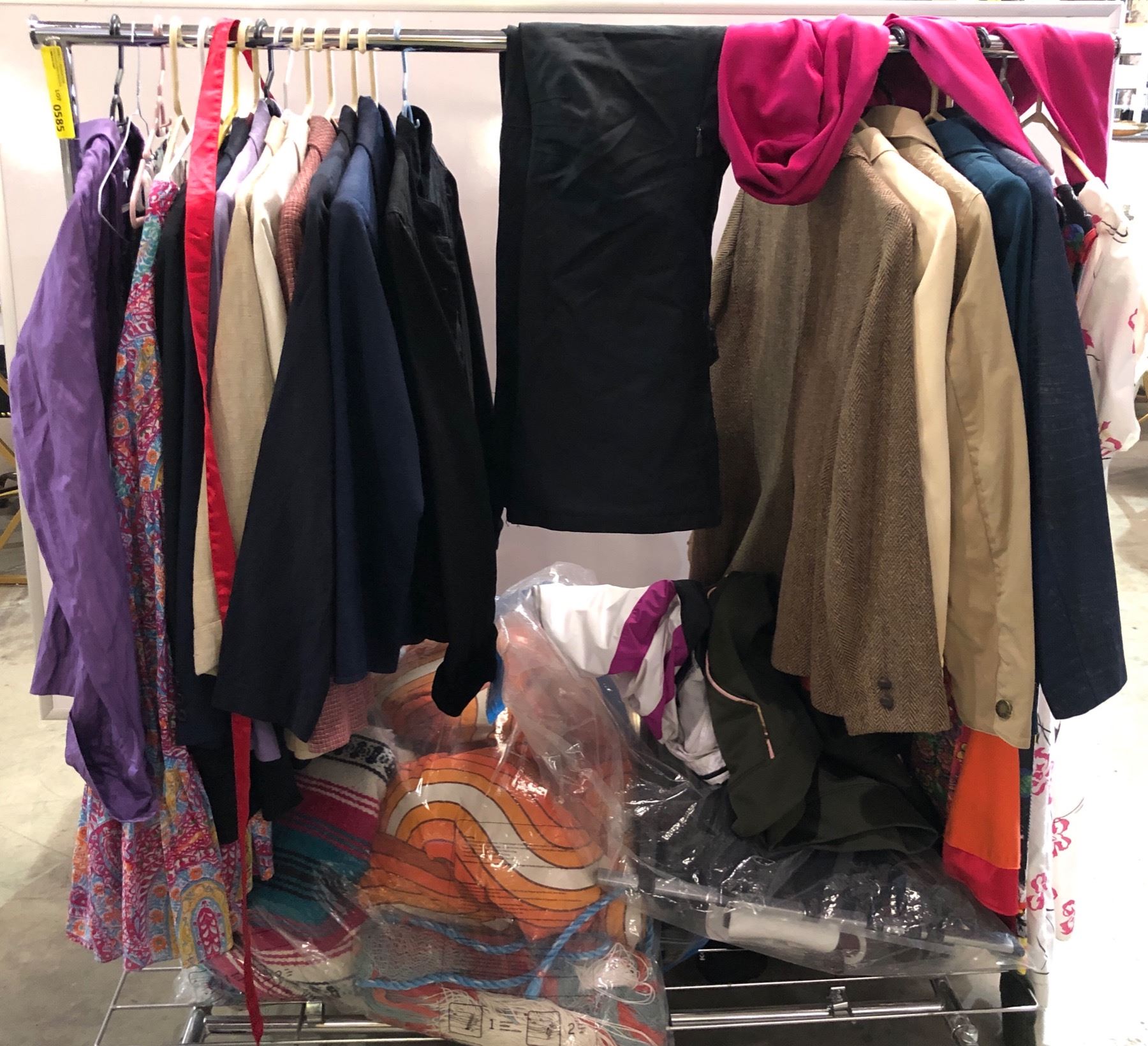 Rack full of assorted movie set dec clothing (rack not included)