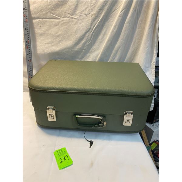 Vintage sewing machine case with key