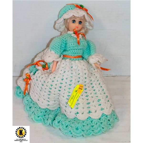 VINTAGE DOLL WITH HAND KNITTED CLOTHING