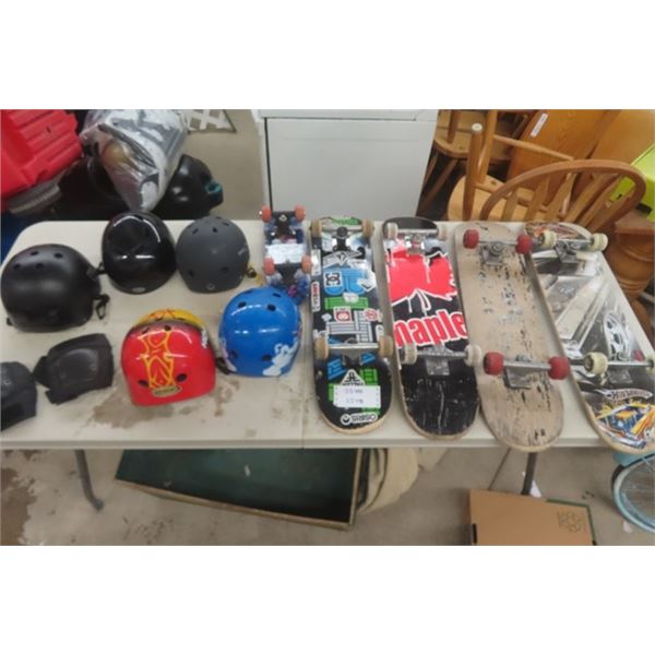 5 Skate Boards, 5 Helmets , 1 Pair of Elbow Pads 