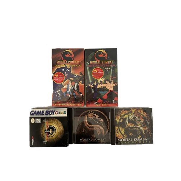 Collection of Mortal Kombat VHS tapes, Gameboy Game and Soundtrack CD.