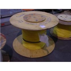 LARGE SPOOL OF LUCENT OPTICAL NETWORK CABLE-YELLOW