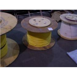 LARGE SPOOL OF LUCENT OPTICAL NETWORK CABLE-YELLOW