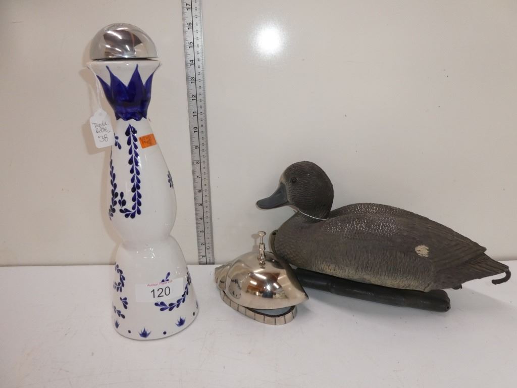 decorative duck, tequila bottle, bell