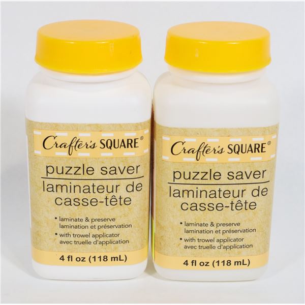 2 NEW BOTTLES OF PUZZLE SAVER GLUE