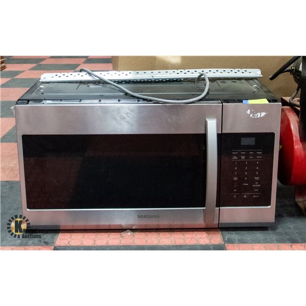 UNCLAIMED SAMSUNG MICROWAVE H-16.5" W-15.25" L-30"