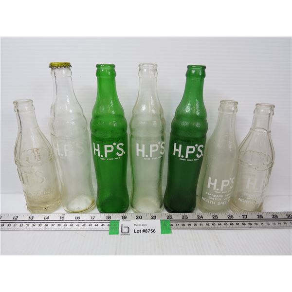 (7) HP Soda Bottles