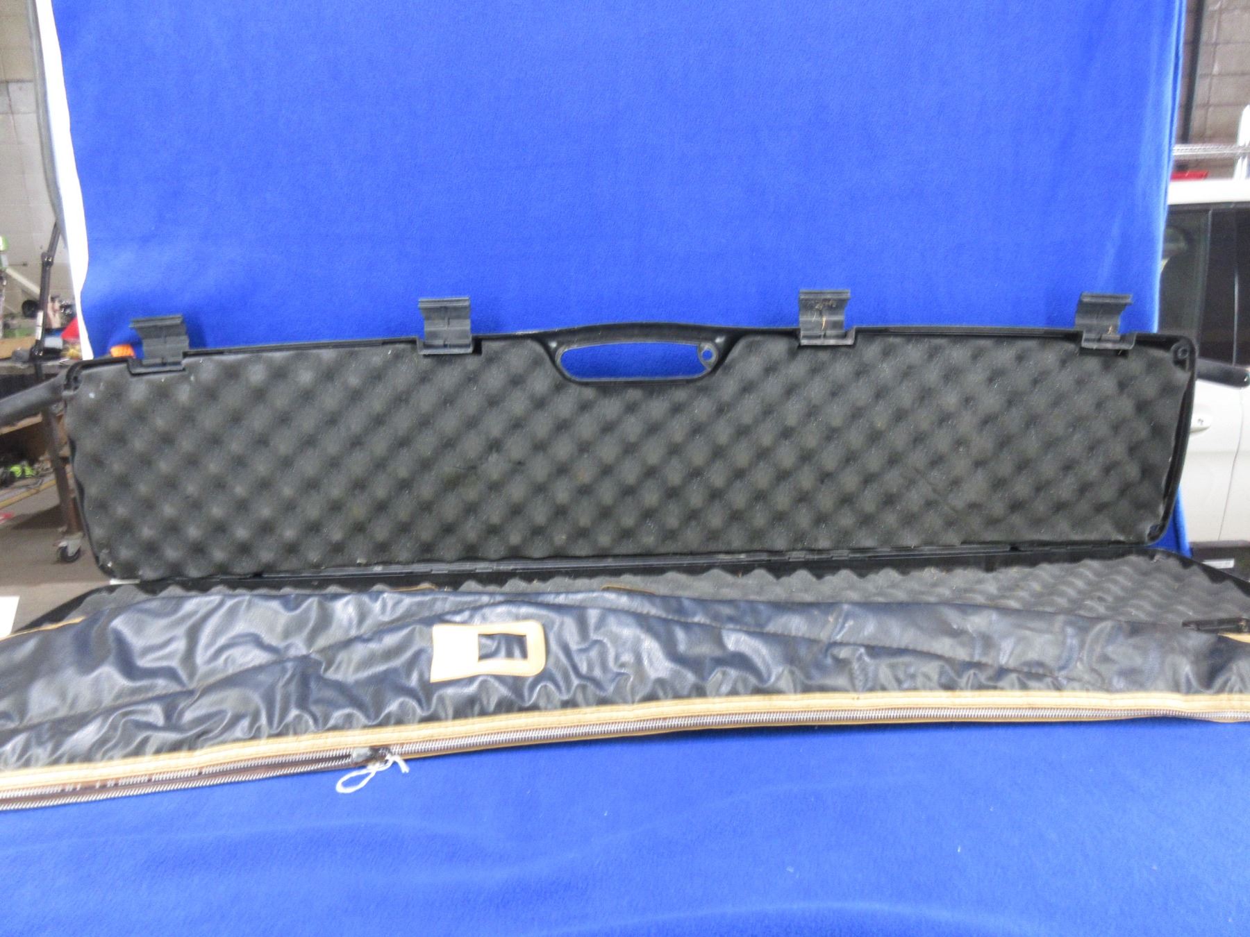 Plano Gun Guard Hard Rifle Case and a Soft Rifle Case