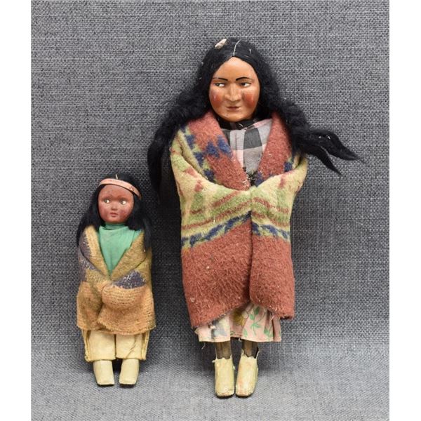 TWO SKOOKUM DOLLS