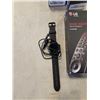 Image 2 : STORE RETURN LOT 2 GARMIN VIVOFIT 4, LG MAGIC REMOTE AND SMART WATCH