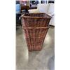 Image 2 : 2 WICKER HAMPERS AND PLANTER