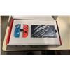 Image 2 : NINTENDO SWITCH CONSOLE - COMPLETE WITH JOYCONS, TV DOCK, CORDS - TESTED WORKING - RETAIL $399