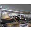 Image 1 : Shelf of Straw Hats and Knee Braces