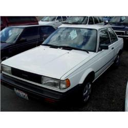 90 NISSAN SENTRA 4SPD 2DR EXMT.                                       