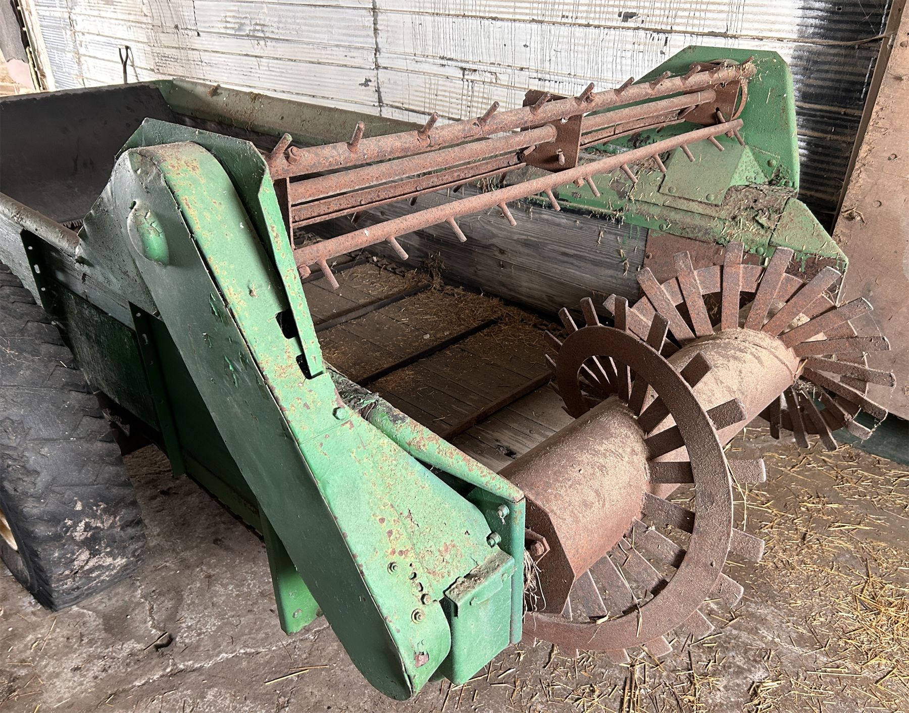 JD MODEL ? MANURE SPREADER STORED INDOORS Kidd Family Auctions