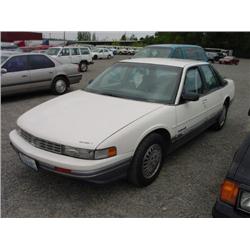 90 OLDSMOBILE CUTLASS 4DR EXMT.                                       