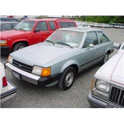 86 FORD ESCORT L 2DR EXMT.                                            