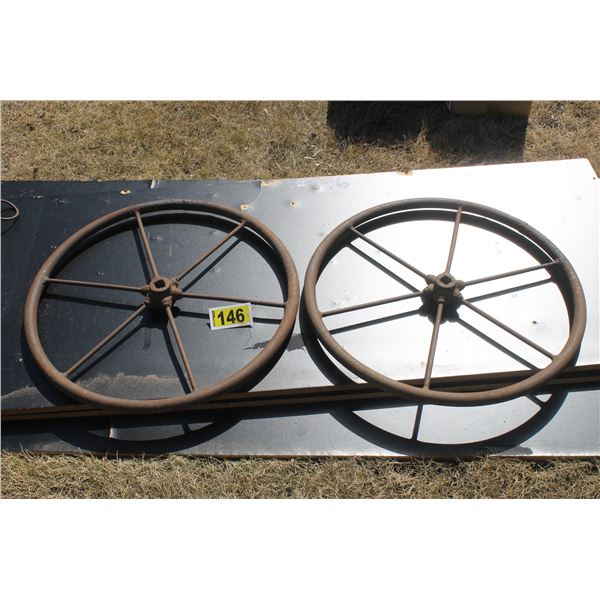 22- Antique wheels (tiller) and 2- damaged table tops