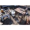 Image 2 : Misc. bottles jacks, grease gun, heavy steel table with vise, steel barrel and propane tanks