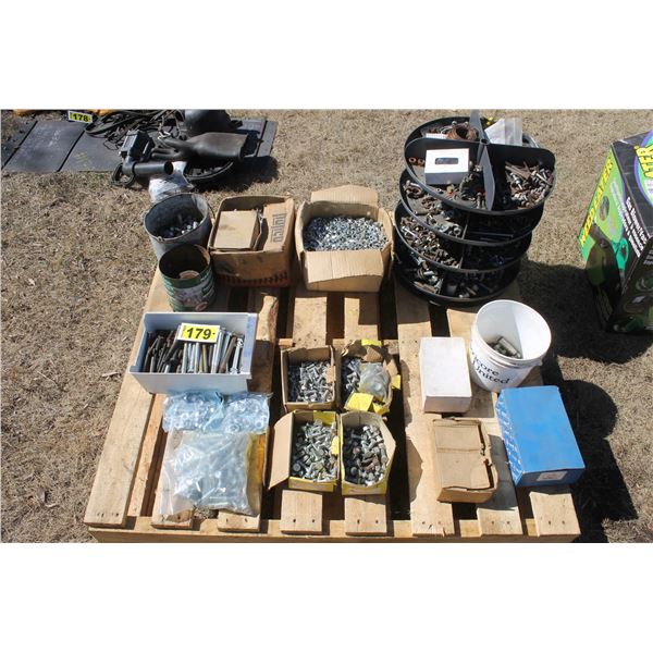 Pallet of mixed bolts, nuts, carriage bolts, showcase shelving c/w nuts & bolts