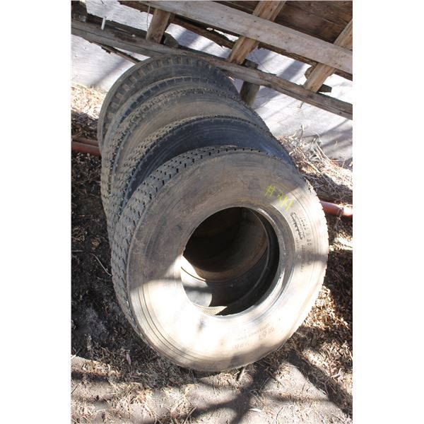 Stack of 10:00 - 20 tires (used)