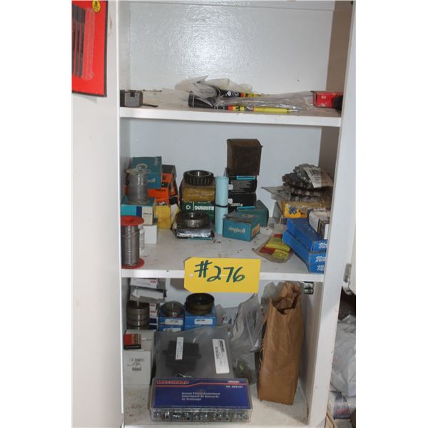 Contents of white shelf, bearing, solder, grease zerks