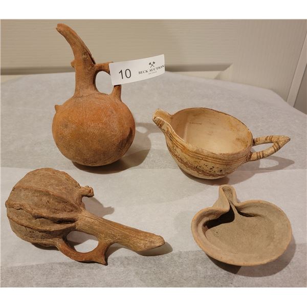 A Collection Of Ancient Hand Crafted Pottery