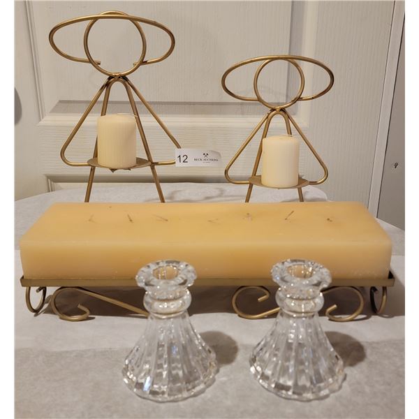 A Charming Assortment Of Candles and Candle Holders