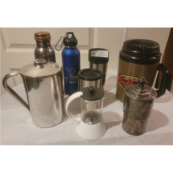 An Assortment of Coffee Related Items( Mugs, Pot and Percolators)