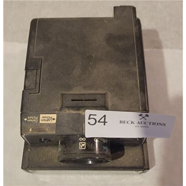 A Keystone: Wizard XF 1000 Instant Camera