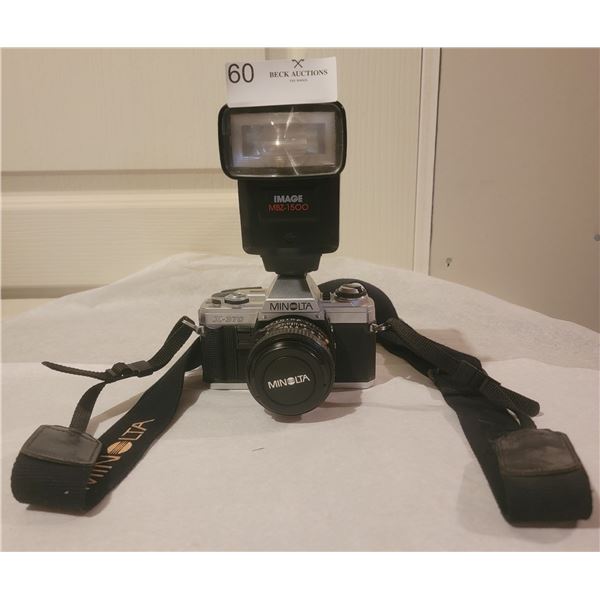A Minolta Camera(x-370) With An Image Flash(MBZ-1500)