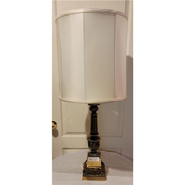An Elegant Vintage Lamp With White Shade