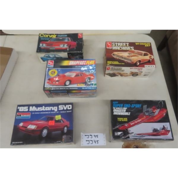 5 Model Kits: '92 Camaro- Sealed, '85 Mustang- Sealed, Dragster Snowmobile- Sealed, '69 Cougar, '69 