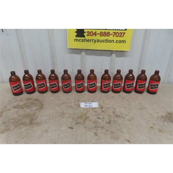 12 Carling Black Label Stubby Beer Bottles 