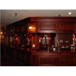 ELABORATE EXOTIC FRONT BAR WITH LIGHTING AND CLOCK