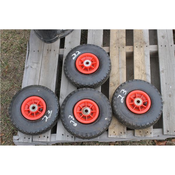 4- 3.00x4 tires on rims