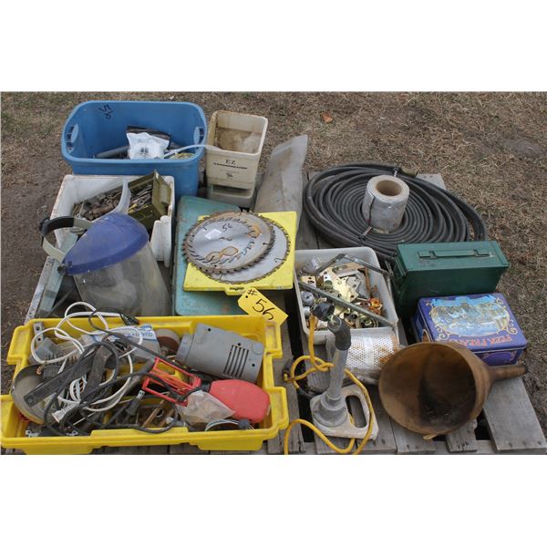 Pallet of misc. plumbing, face shield, saw blades and garden hose