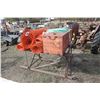 Image 1 : Red square tank, snow fence on a pipe skid rack