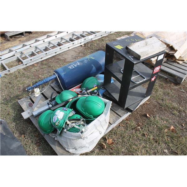 Blue tank, hard hats, steel rotating stand display