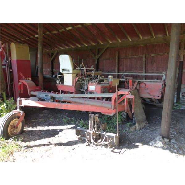 Case 950 Swather c/w Pickup reels, running when parked. (At Adolph's, PH. Adolph Pasay- 780-942-2153