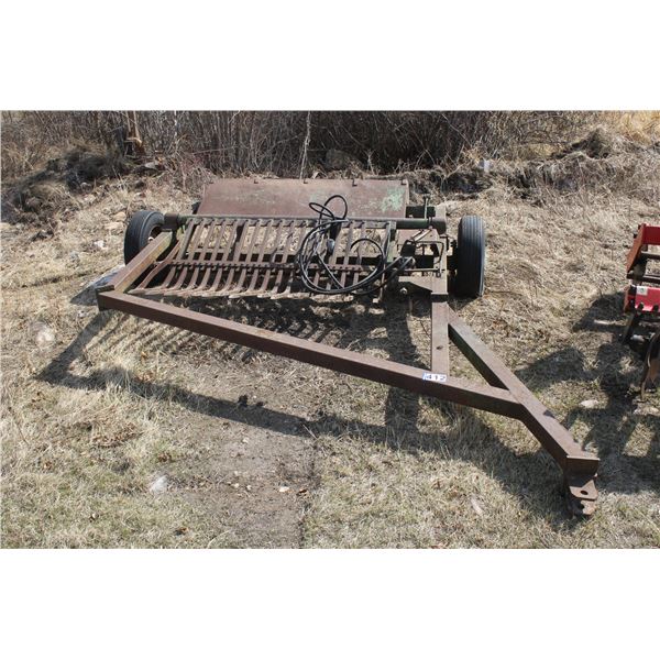 Prong type rock picker c/w ram