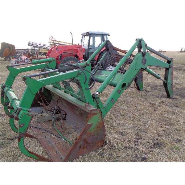 JD 740 F.End Loader, 7' bucket & grapple, (BURNT) (PH Terry (780) 907-4064) Location 4.1 Km North fr