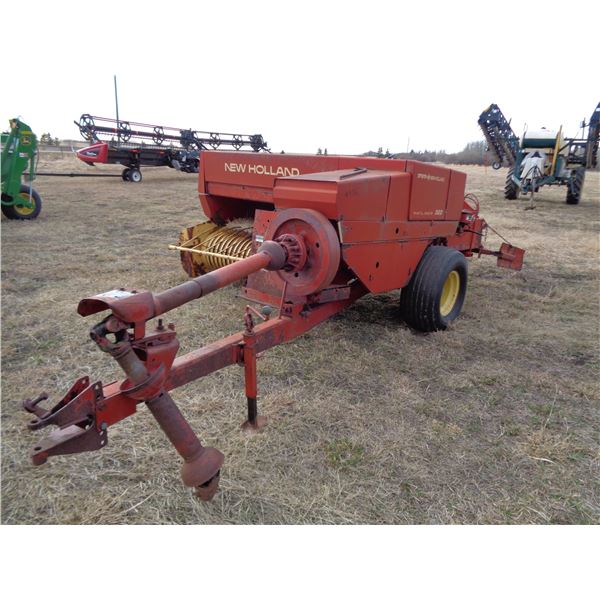 NH 320 Square baler, 64" pickup, hyd. Tension, 1/4 turn, SN. 570346 (PH Terry (780) 907-4064) Locati